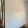 Living room with wall in neutral Resene Alabaster and artwork in Lustacryl semi-gloss