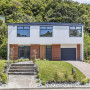 House exterior painted in neutral Resene Eighth Truffle