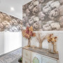 Hallway painted neutral with Resene Pearl and top-half of wall featuring Resene wallpaper
