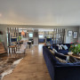 Open plan living and dining area featuring walls in Resene Half Pravda and ceiling in White