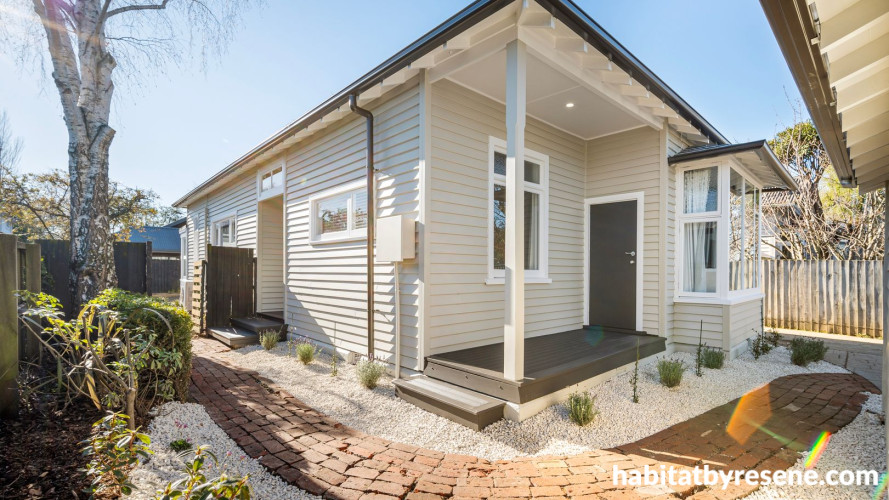 House with exterior featuring Resene Half Grey Olive and trims in Black White