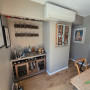Bar and dining area featuring walls in Resene Half Pravda, trims in Black White