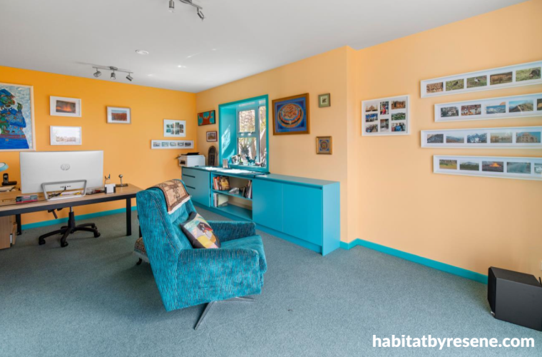 Home office featuring pale orange walls