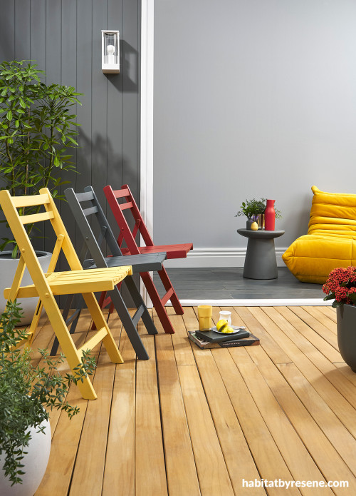 Outdoor patio featuring bright coloured chairs