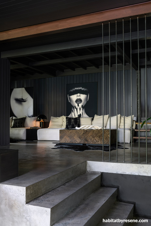 Living room painted in striking black Resene Element