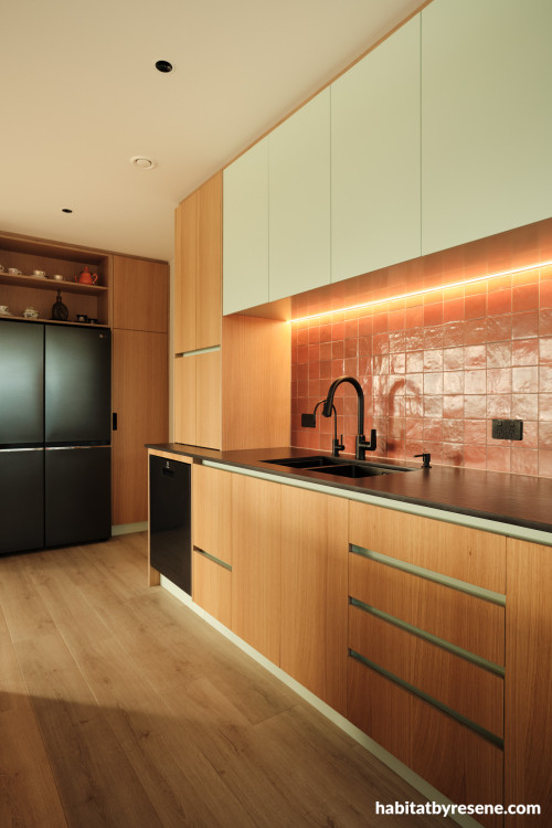Kitchen featuring light-summery green cabinets