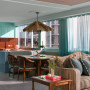 Kitchen cabinetry and dining space feature Resene Aqua and Awash