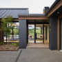 House exterior featuring dark brickwork
