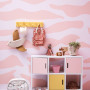 Kids room featuring pink zebra-patterned wall