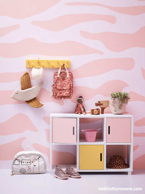Kids room featuring pink zebra-patterned wall